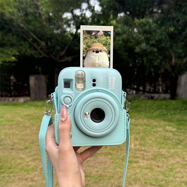 Подарунковий набір камера Fujifilm Instax Mini 13, Фотопапір 50 шт, Чохол шкіряний, Фотоальбом на 64 фото Зелений NAB1M13_50_GRE фото